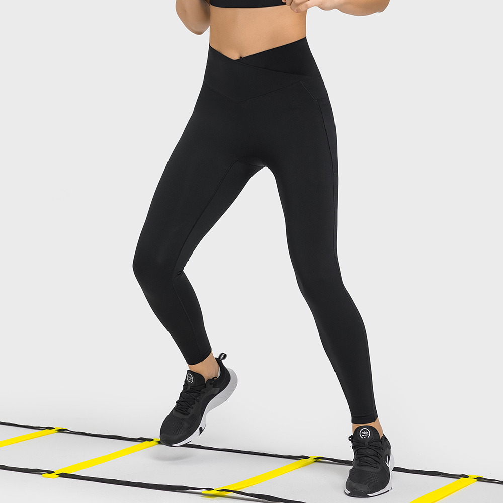Buy different colors and types of no front seam high waist criss cross capri leggings with side pockets on Hergymclothing Black