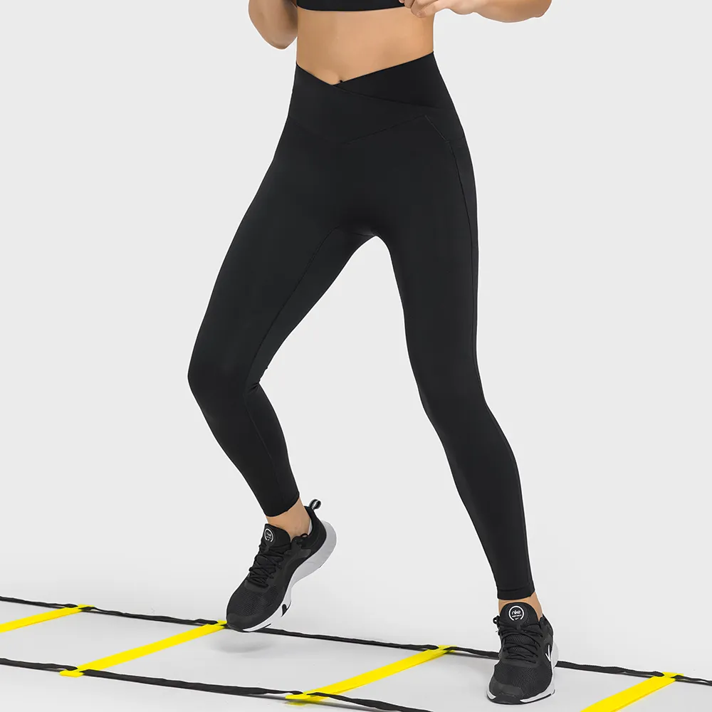 Buy different colors and types of no front seam high waist criss cross capri leggings with side pockets on Hergymclothing Black