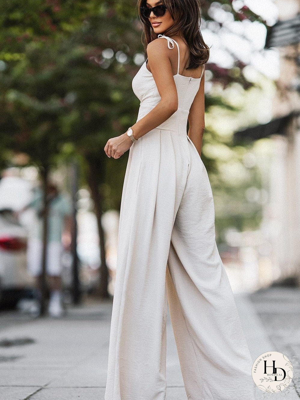 Elegant Beige Pleated Wide Leg Jumpsuit with Spaghetti Straps