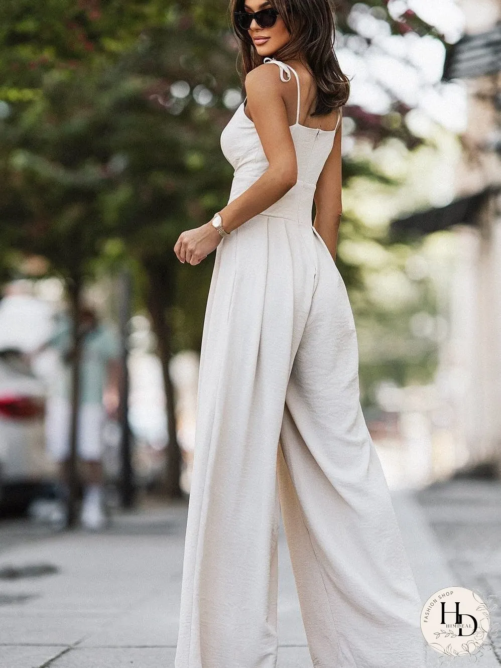 Elegant Beige Pleated Wide Leg Jumpsuit with Spaghetti Straps