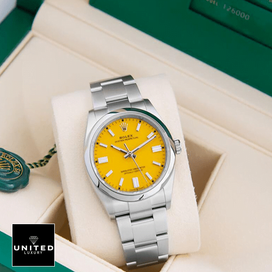 Rolex Perpetual 124300 Oyster Yellow Dial Replica in the Green Box