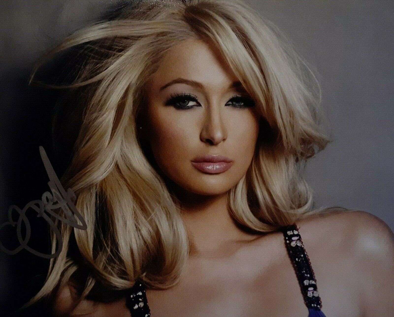 Paris Hilton signed 8x10