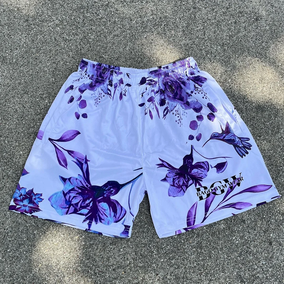 Hummingbird floral print mesh shorts