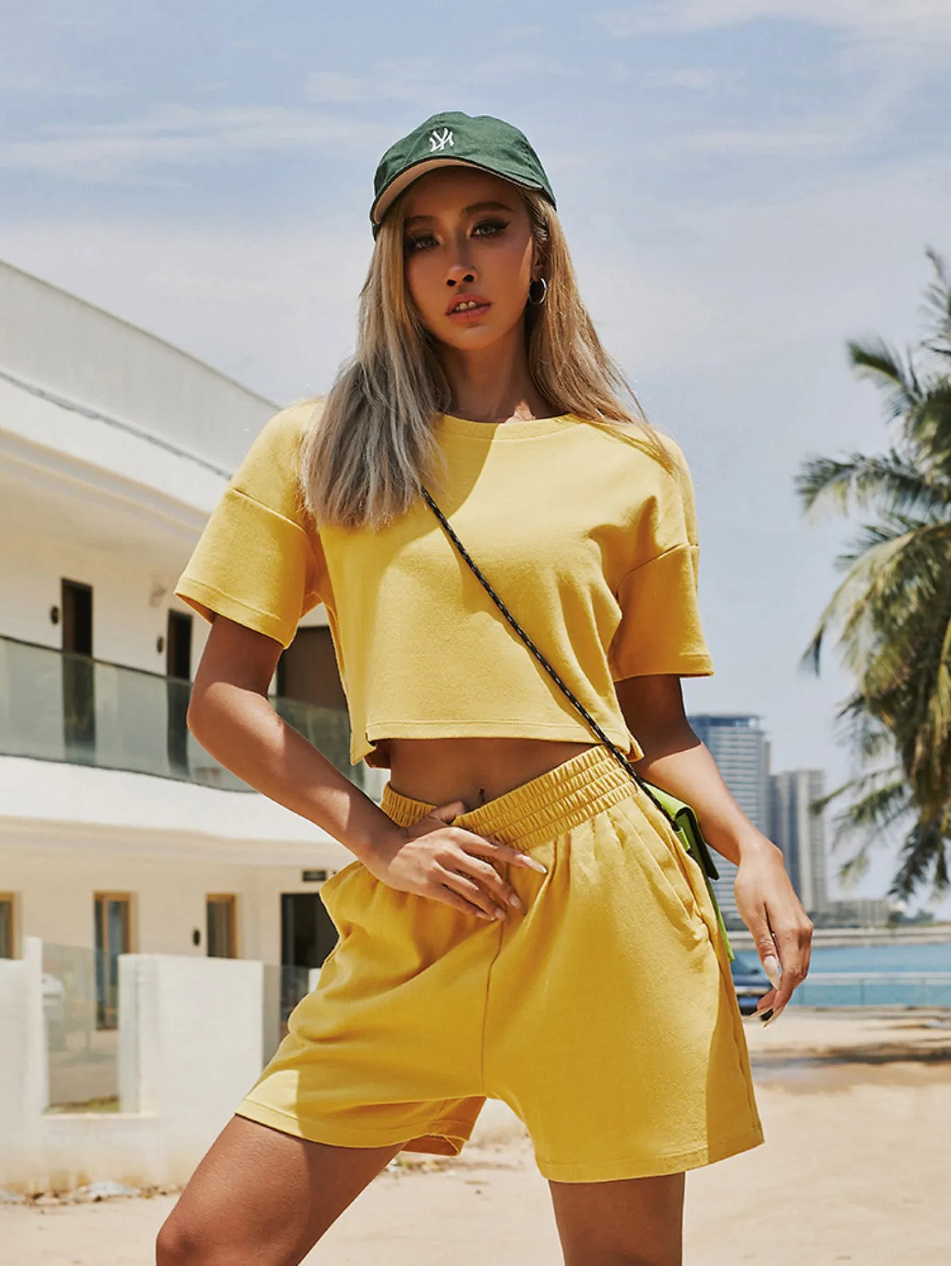 women yellow short sleeve tops and shorts tracksuit