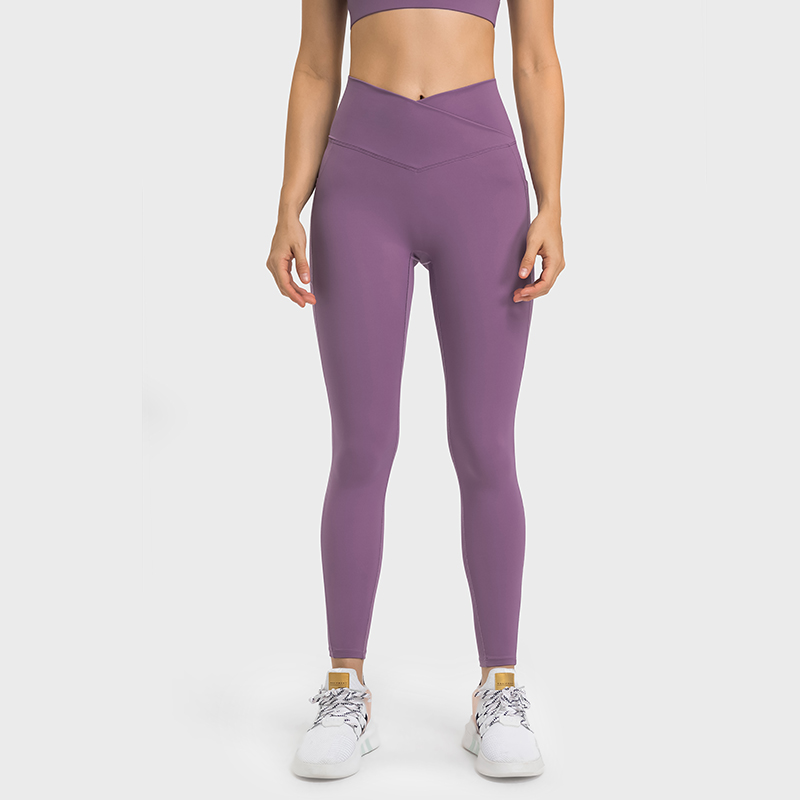 Hergymclothing Saffron Purple no front seam high waist criss cross capri leggings with side pockets for sale
