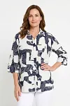Front view of women's navy and white abstract geometric print shirt with 3/4 sleeves