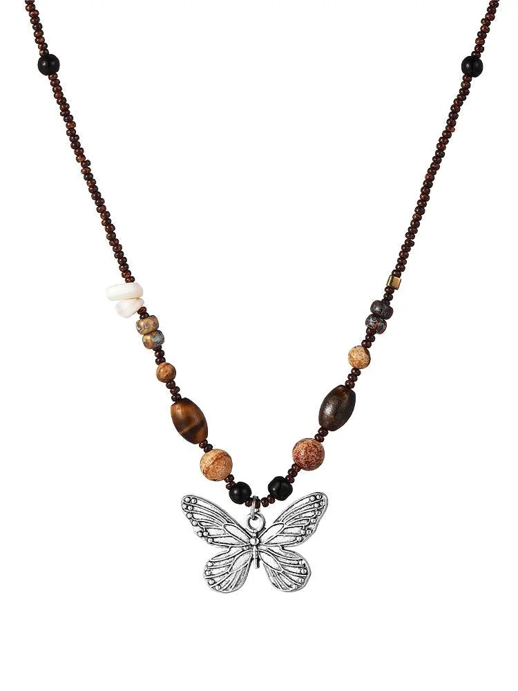 Brownm butterfly necklace with pearl stones
