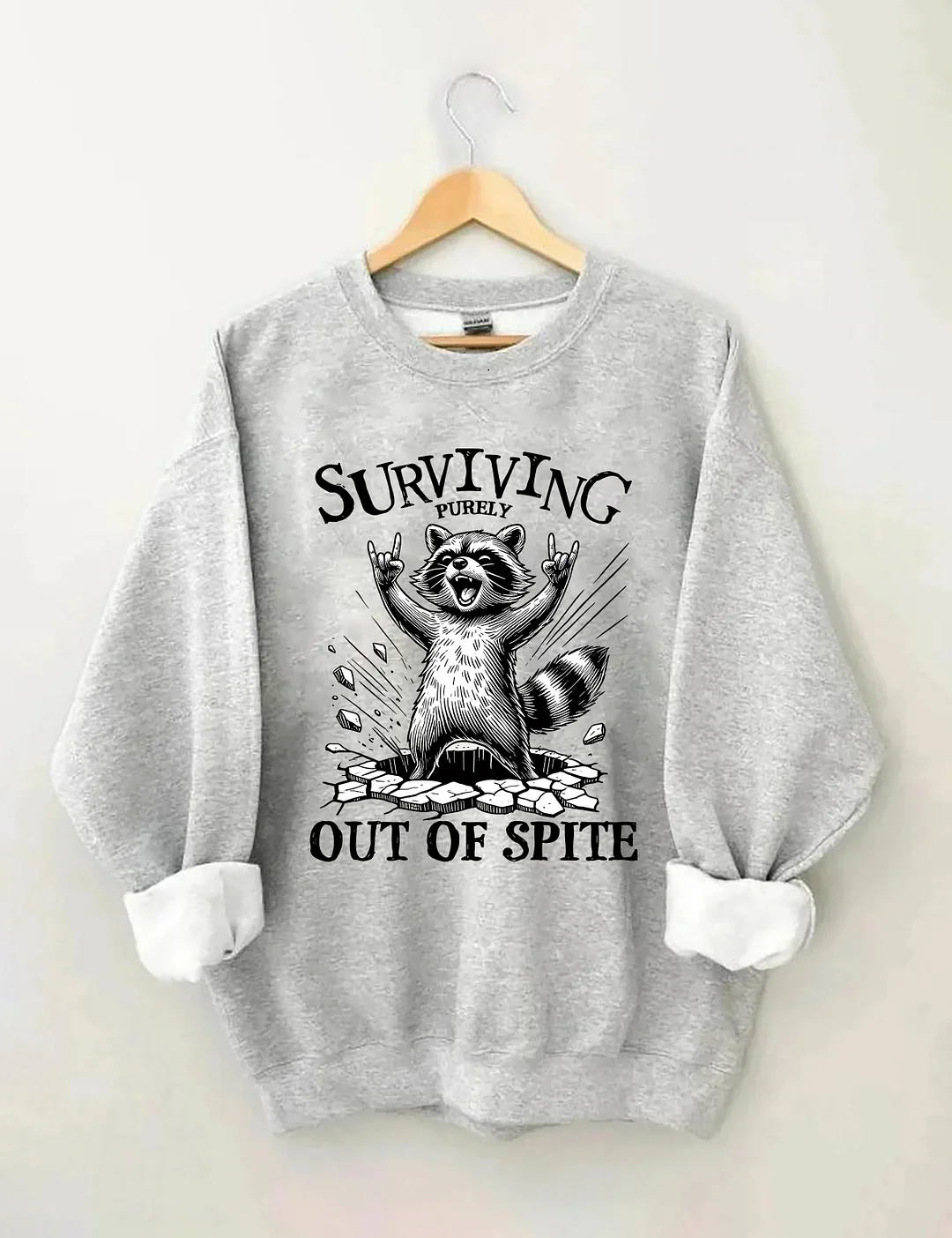 Surviving Purely Out Of Spite Raccoon Sweatshirt