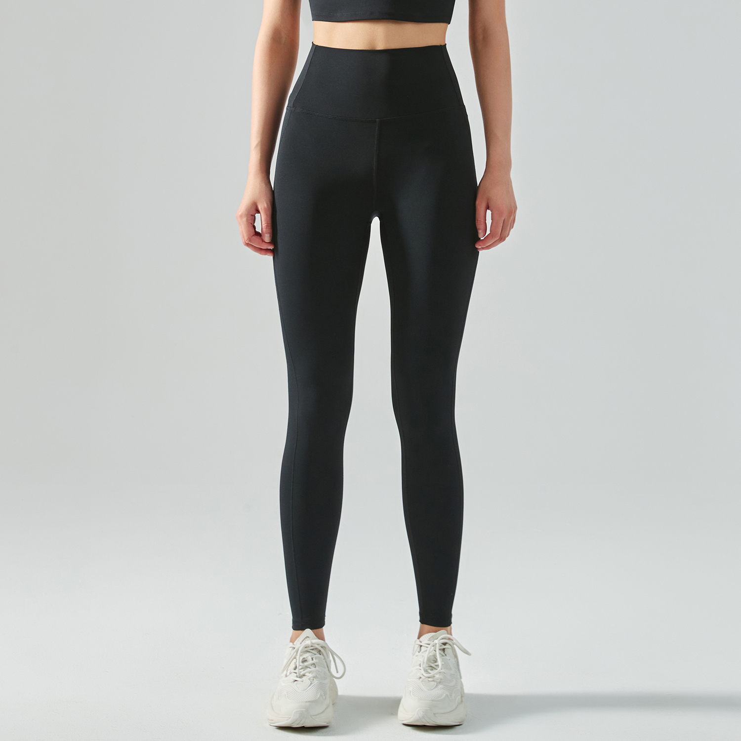 Hergymclothing Black women's mid strength side cross widened waist tummy control moisture wicking traceless sports tight capri leggings online shopping