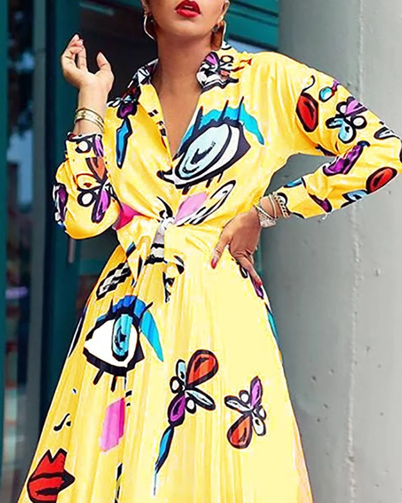 Eye-printed long-sleeved shirt + pleated skirt two-piece suit