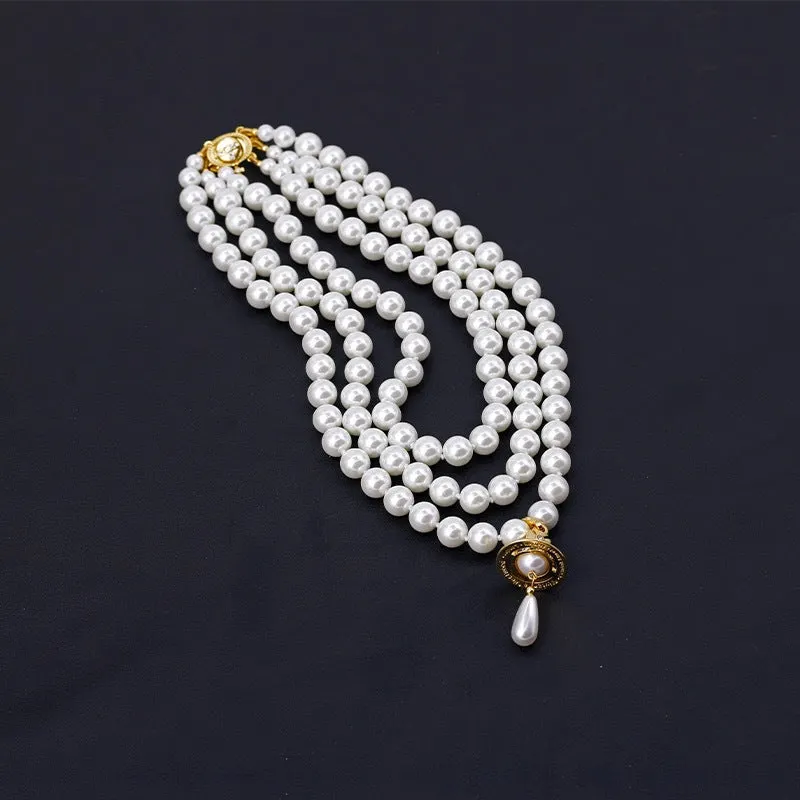 Vivienne Westwood Teardrop Saturn Three Row Pearl Necklace
