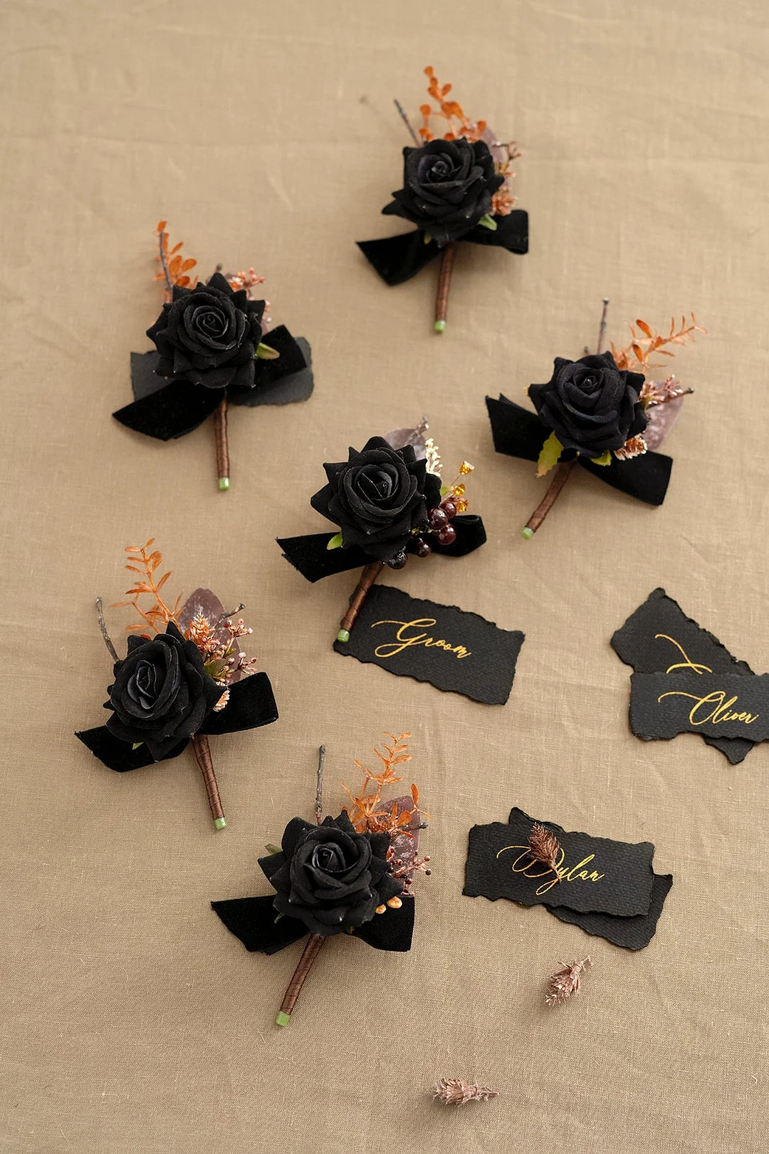 Boutonnieres in Black & Pumpkin Orange