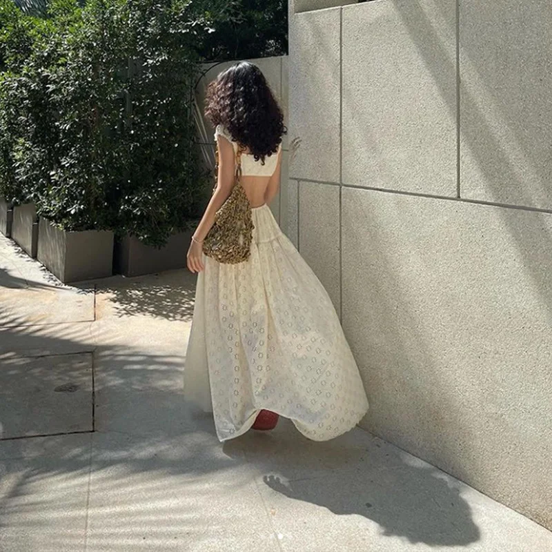 Uveng Uveng Summer New French Temperament Short Style Show Thin Waist Sling Top Beach Holiday Wind Skirt Suit