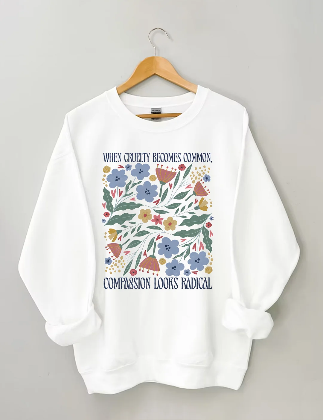 When Cruelty Becomes Common Compassion Looks Radical Sweatshirt