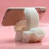 3D Printed Herringbone Gear Desktop Phone Holder