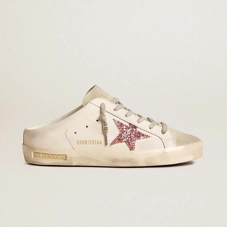 Mules Golden Goose Gold Super-Star de base biológica con estrella rosa brillante y puntera de ante
