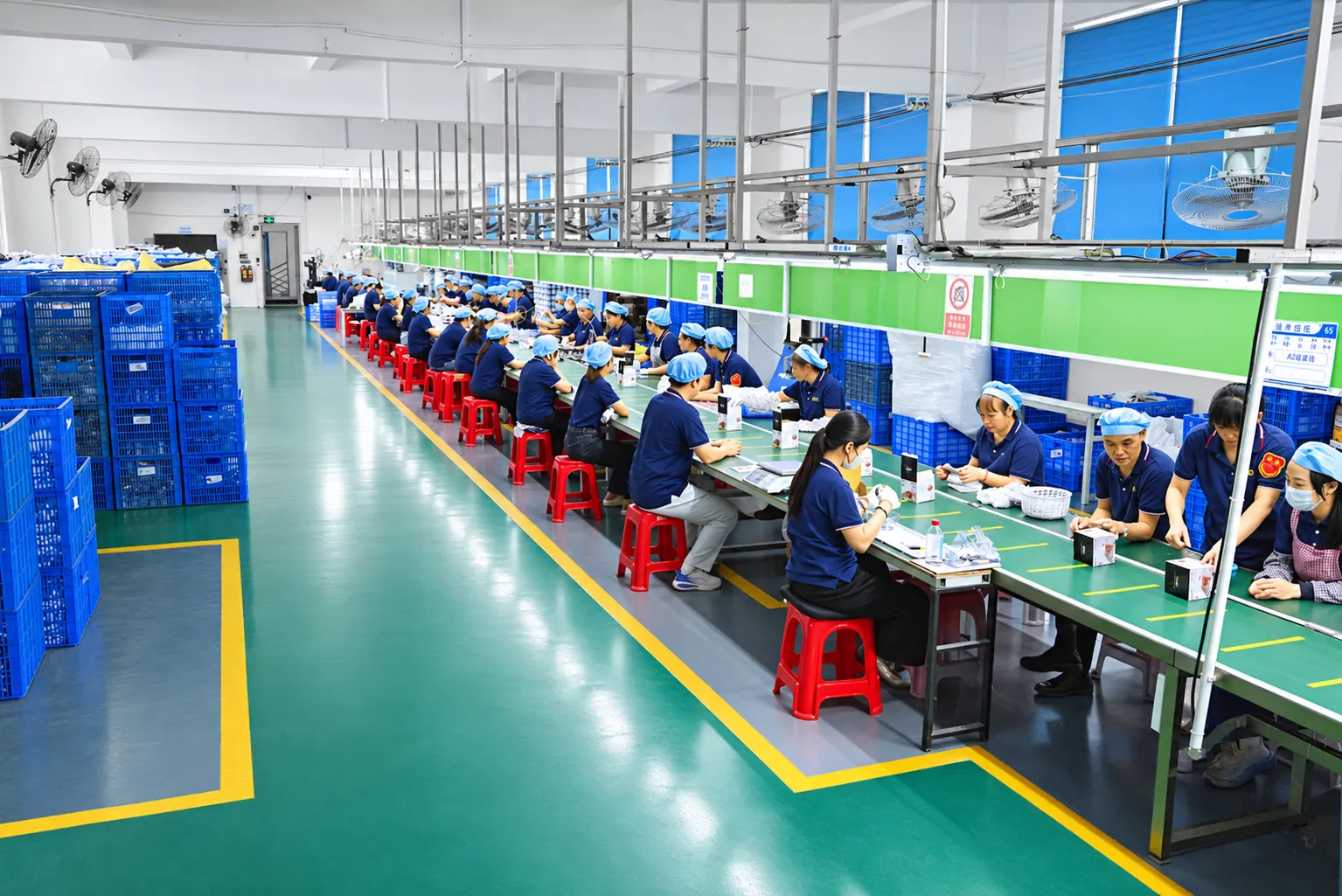 GDL team assembling and packing kitchen tools along the production line