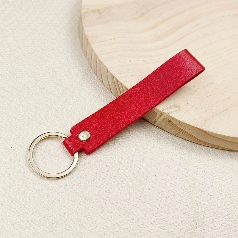 Solid Color Leather Key Chain Hand Rope Bag Pendant Doll Lanyard Fashion Couple Car Key Chain Accessories