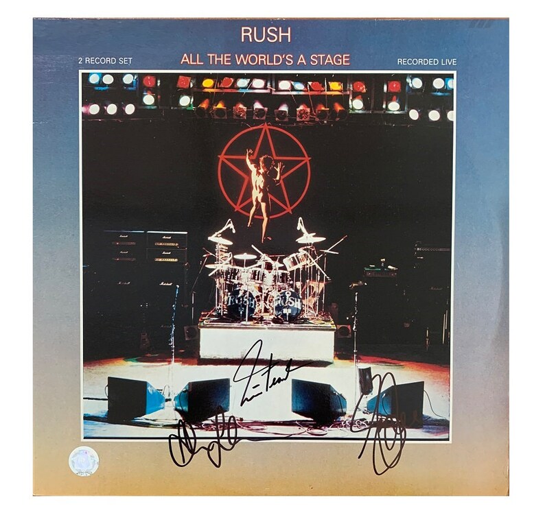 RUSH All the Worlds a Stage Signed Album x3Getty Lee, Alex Lifeson, Neil Peart wCOA