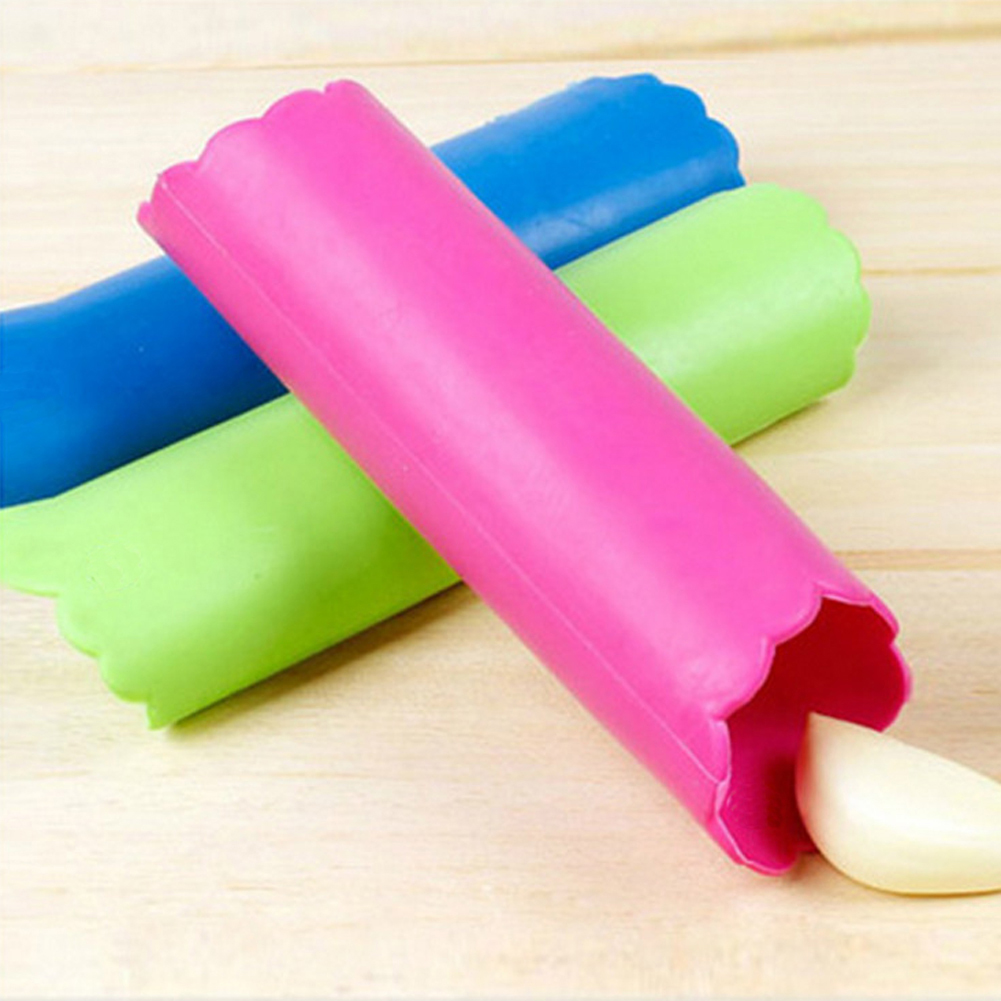 

Magic Silicone Garlic Peeler Useful Kitchen Dining Tool Gadget Color Random, 501 Original