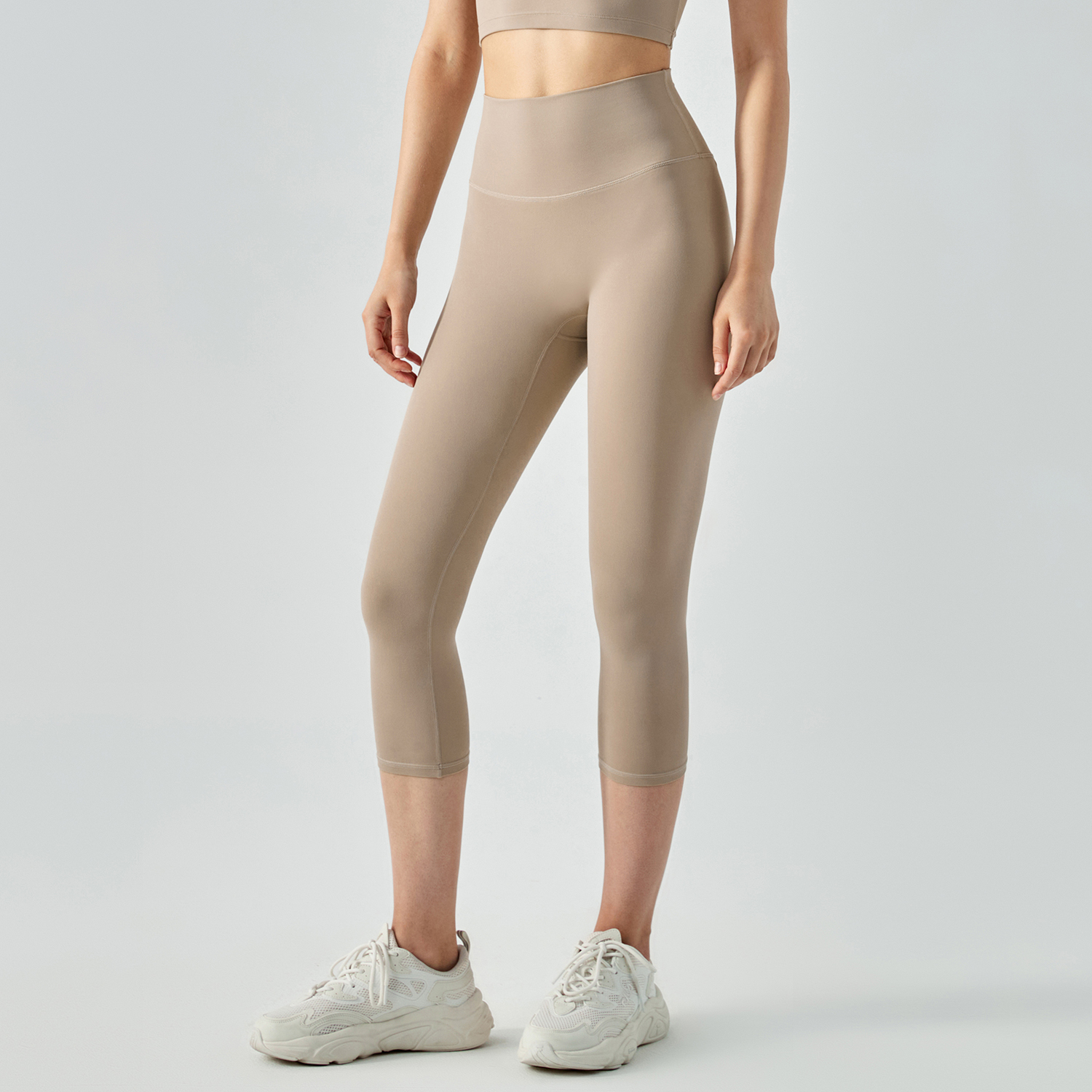 Buy different colors and types of no camel toe high waist buttery soft brushed stretchy yoga capri leggings on Hergymclothing Khaki