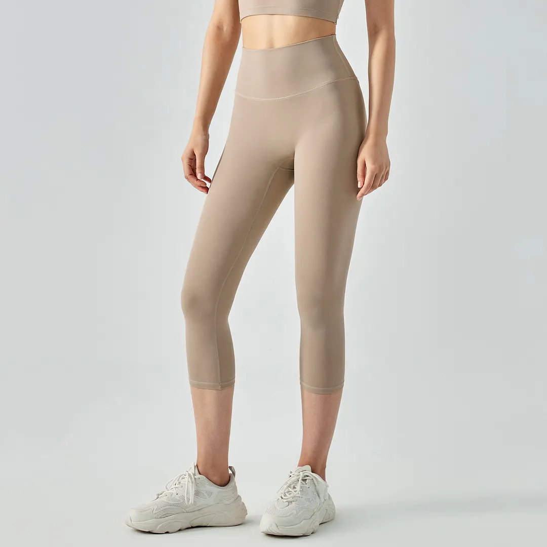 Buy different colors and types of no camel toe high waist buttery soft brushed stretchy yoga capri leggings on Hergymclothing Khaki
