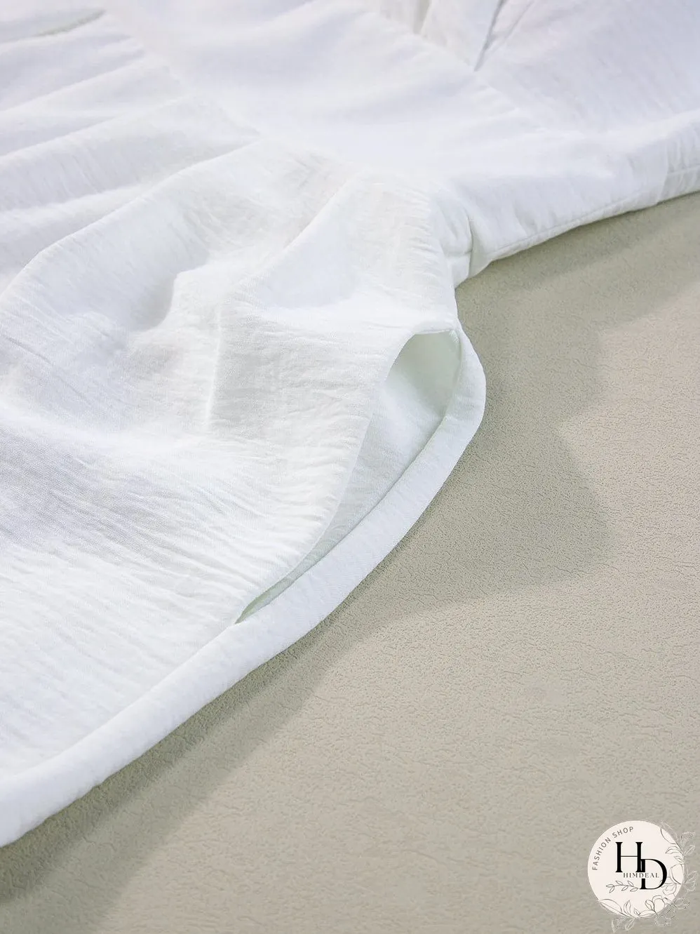 Elegant Beige Pleated Wide Leg Jumpsuit with Spaghetti Straps