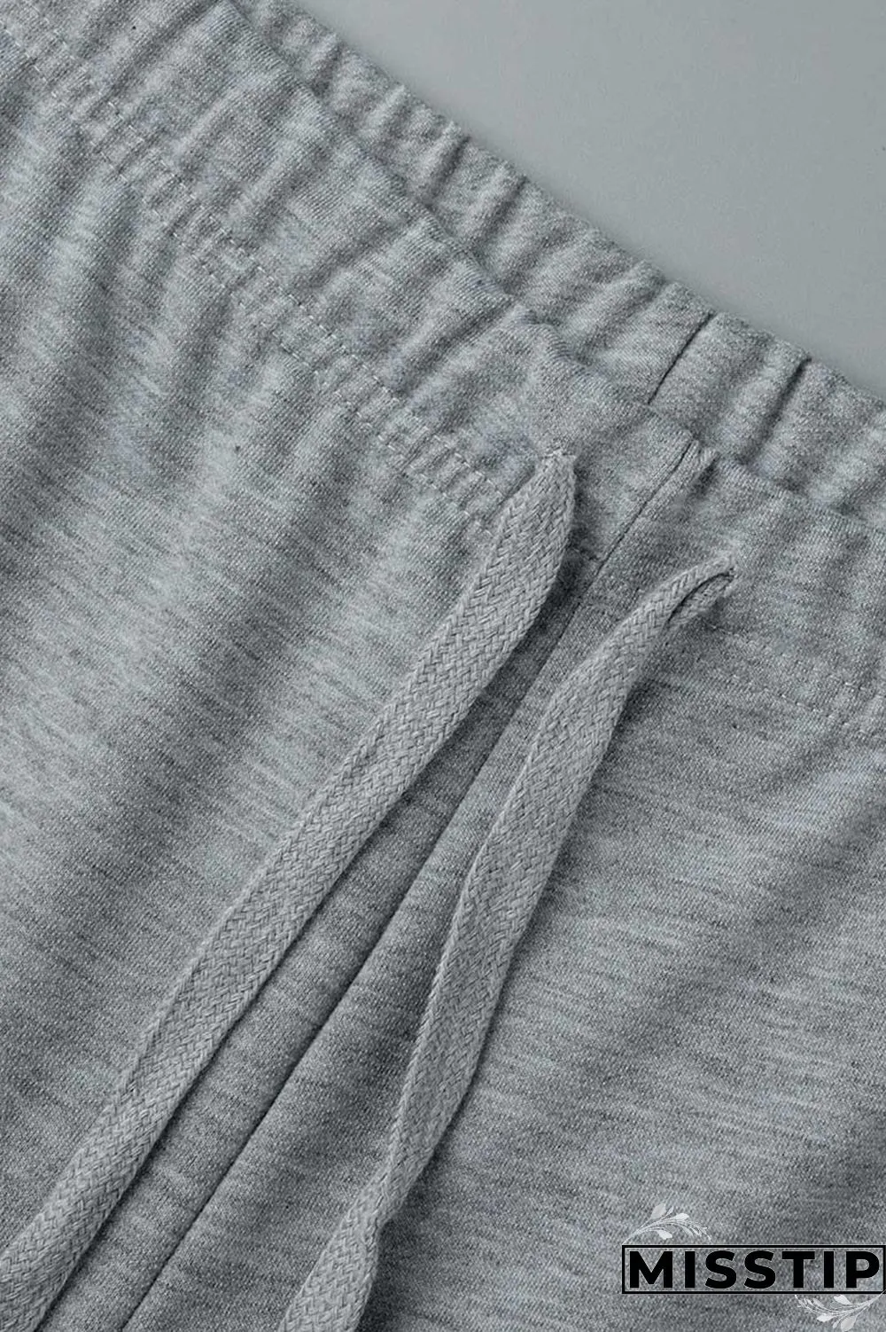 Grey Casual Street Solid Hollowed Out Patchwork High Waist Speaker Solid Color Bottoms