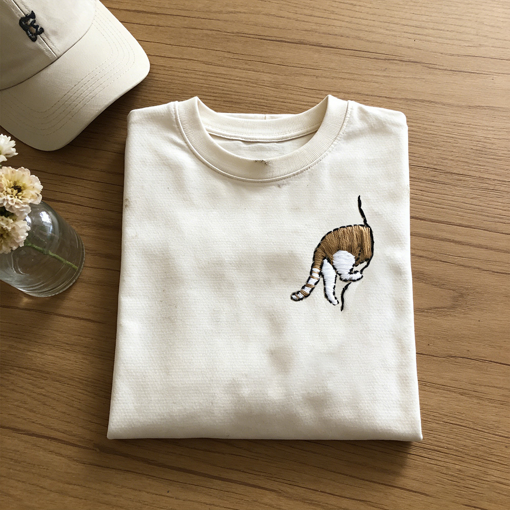 Cat Sewing Through Doorway Embroidered Washed Short Sleeve T-shirt elevenforest