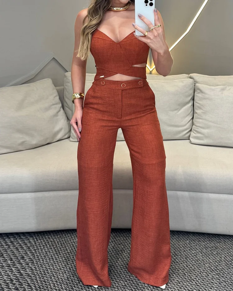 Sleeveless solid color hollow jumpsuit