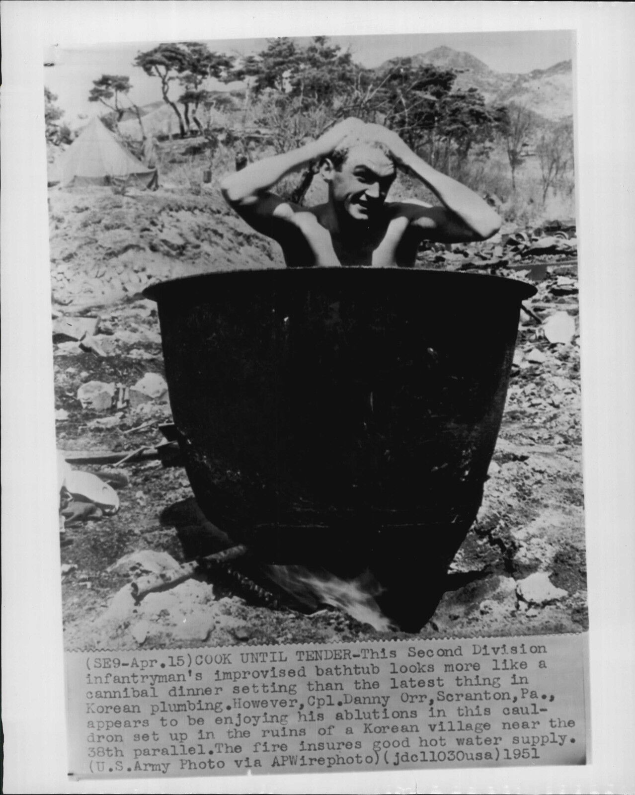 US Army Soldier Takes Bath in Cauldron in Korea Press Photo Poster painting