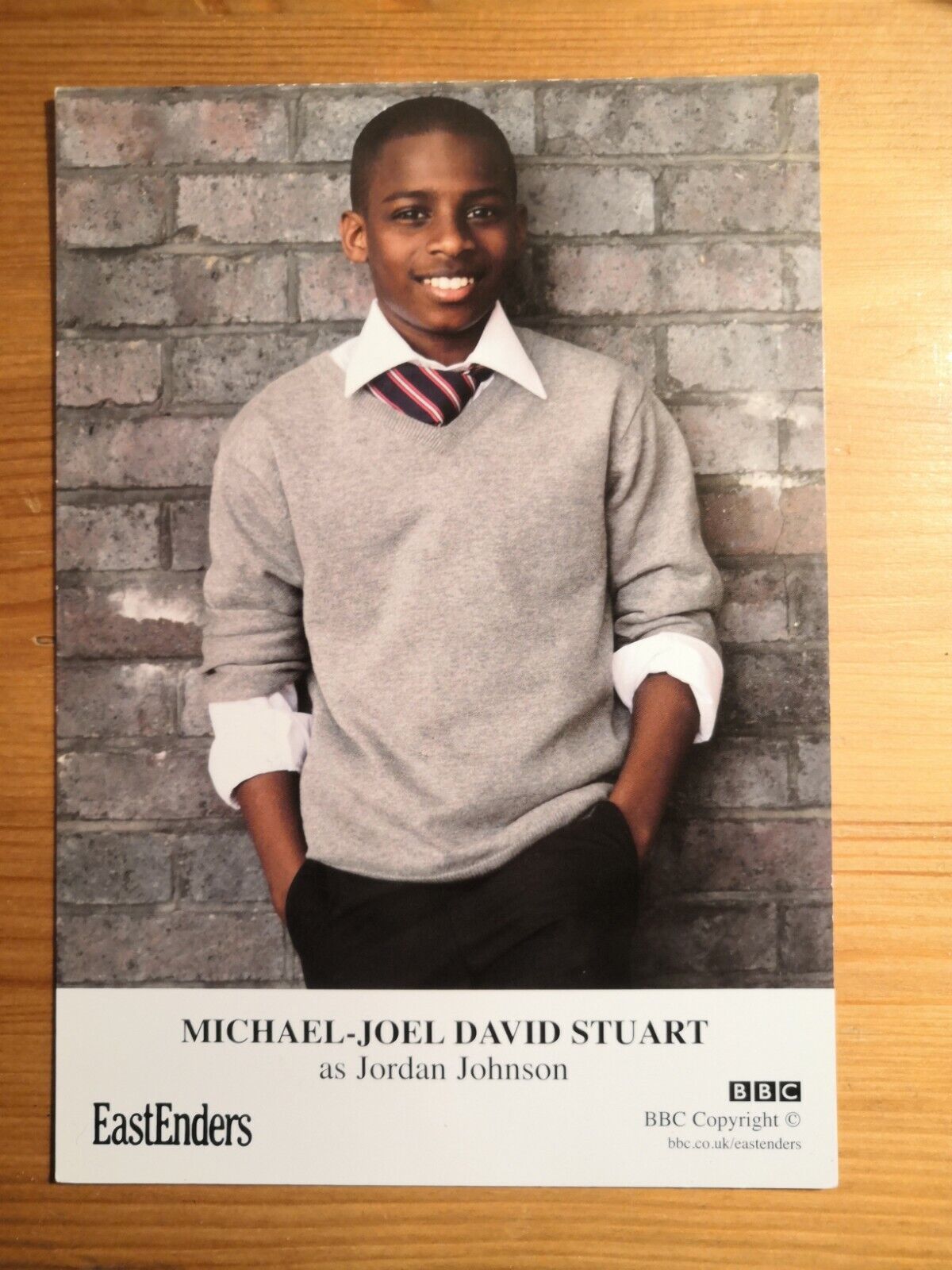 EASTENDERS UNSIGNED CAST CARD OF MICHAEL JOEL DAVID STUART