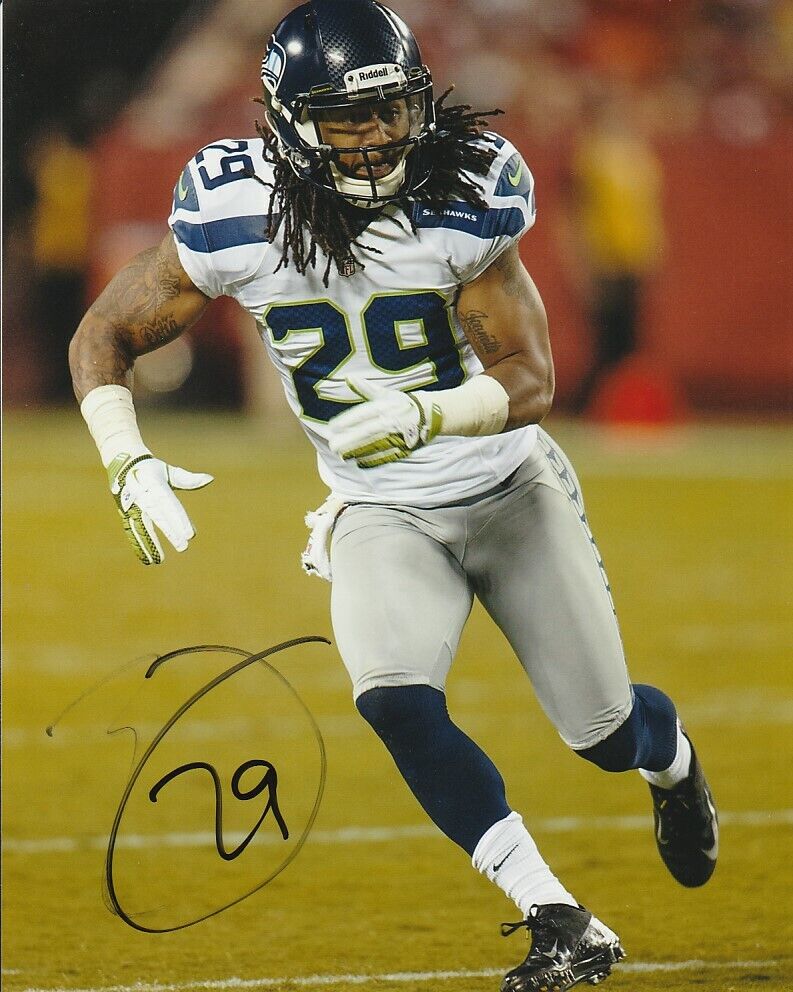 EARL THOMAS SIGNED SEATTLE SEAHAWKS FOOTBALL 8x10 Photo Poster painting! NFL EXACT PROOF!