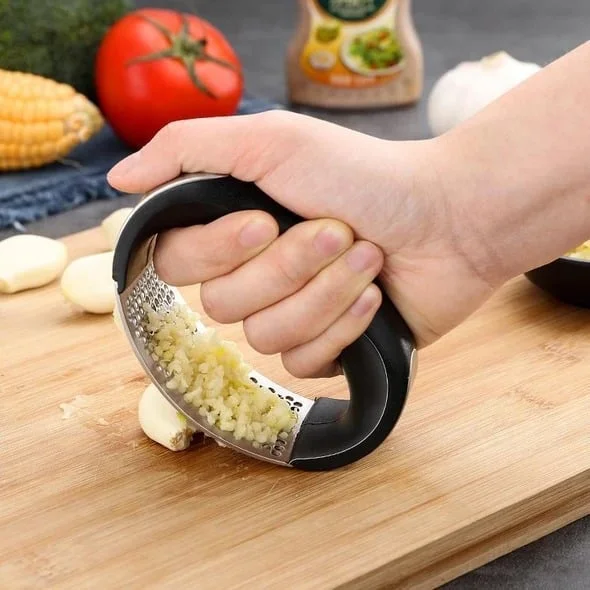 Stainless steel garlic presser