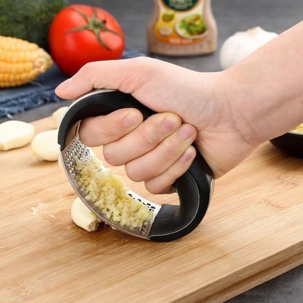 Stainless steel garlic presser