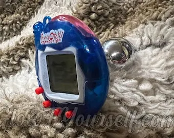 pornhint Pornhint You remember Tamagotchis? Now its a butt plug/keychain! Mature adults only, wtf is even happening lol