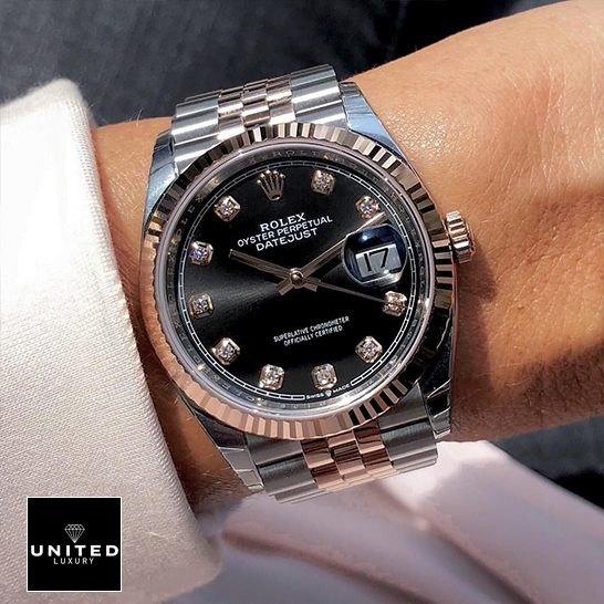 Rolex Diamond 126231 Black Dial Replica on the wrist