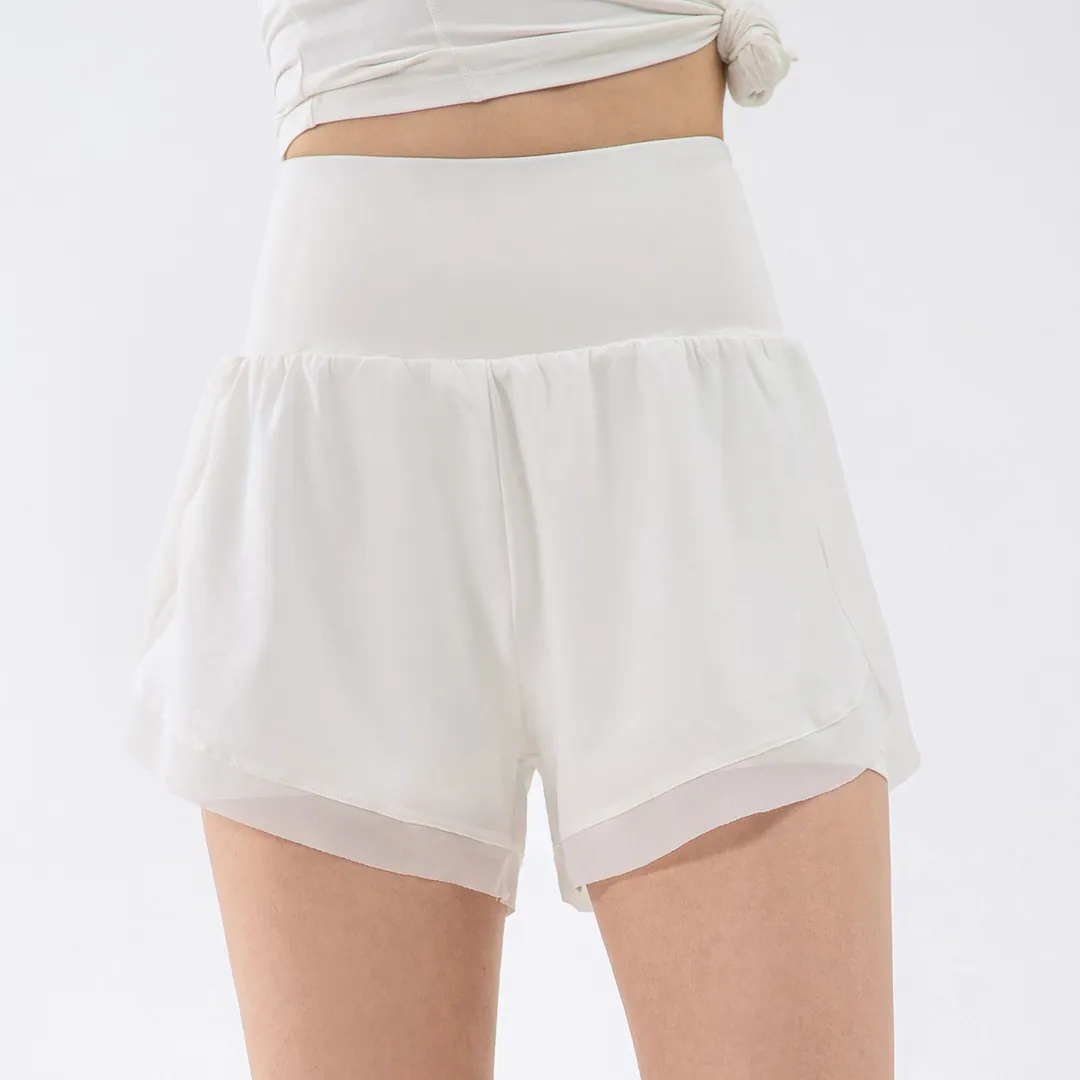 Buy Hergymclothing White skin friendly buttery soft anti wardrobe malfunction sports fitness workout 2 in 1 running shorts with inside pockets at an affordable price