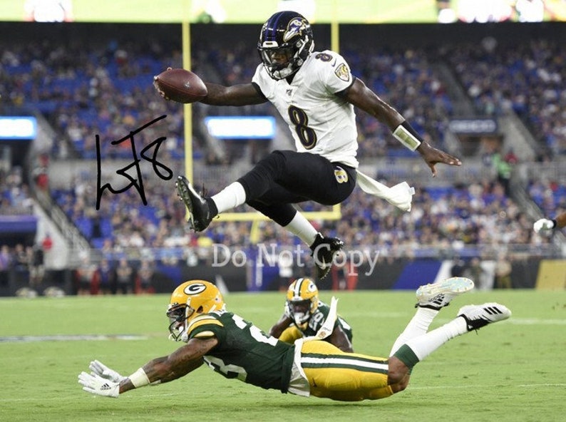 Lamar Jackson Signed Photo Poster painting 8X10 rp Autographed Picture Baltimore Ravens