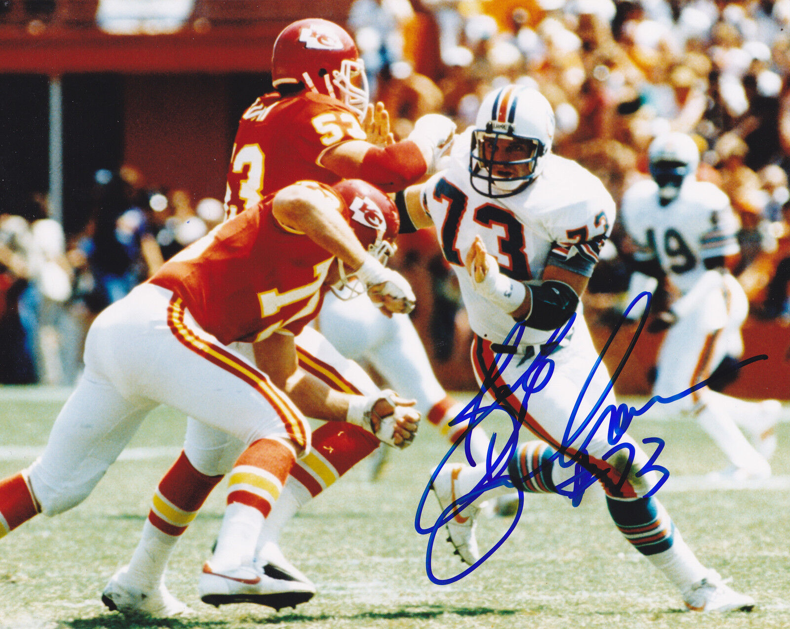 BOB BAUMHOWER MIAMI DOLPHINS ACTION SIGNED 8x10