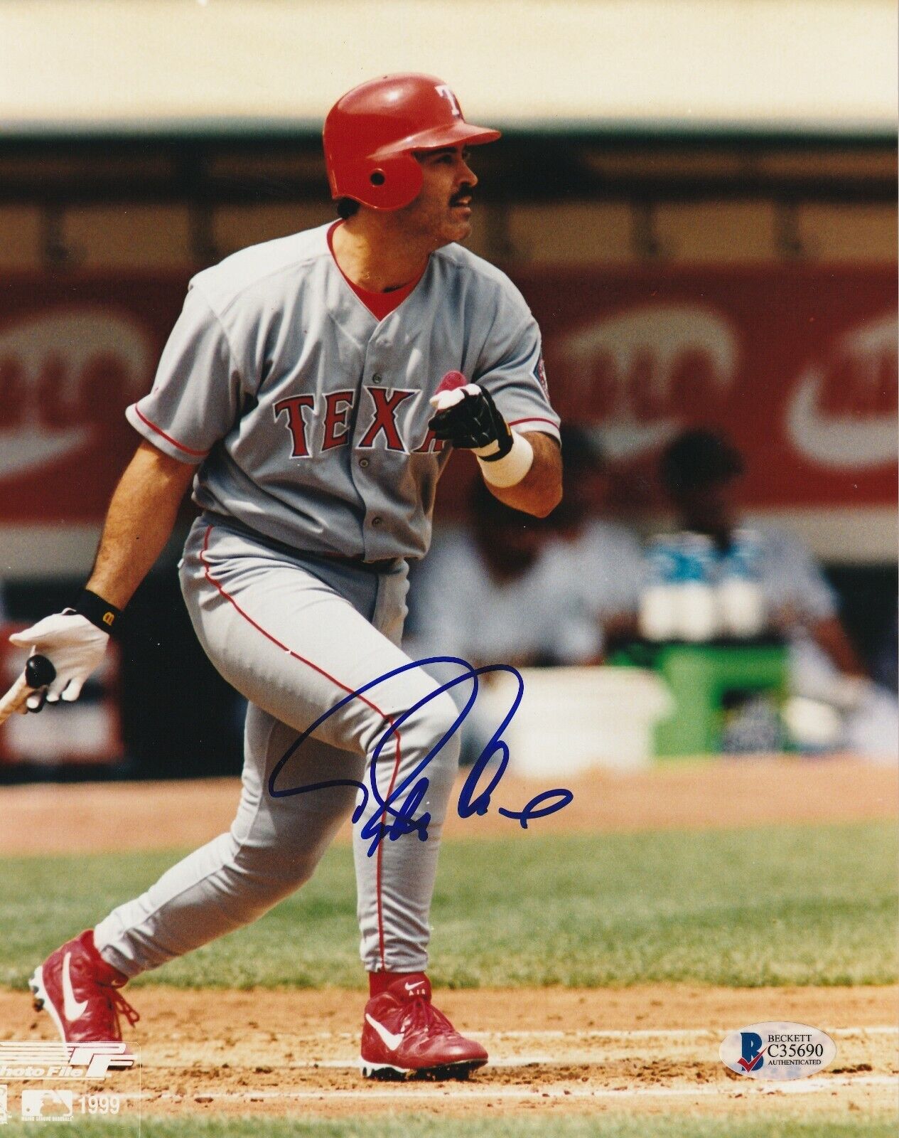 RAFAEL PALMEIRO (Rangers) Signed 8X10 Photo Poster painting w/ Beckett COA