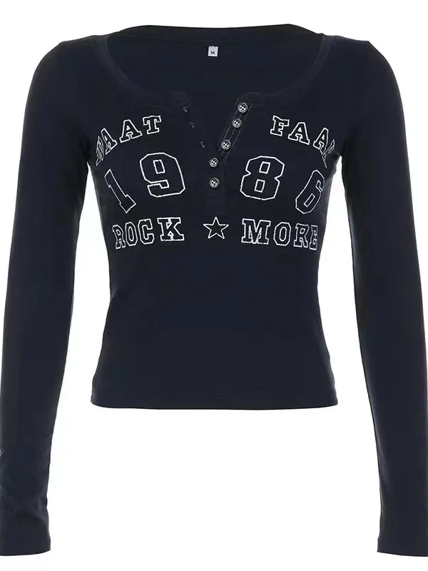 Brownm dark blue long sleeve top with letter logo