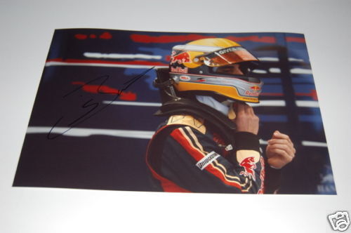 Toro Rosso F1 Photo Poster painting signed by Sebastien Buemi.