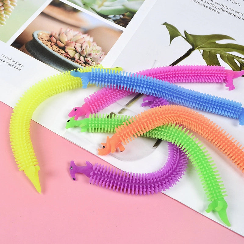 Hot Sale TPR Soft Material Dinosaur Lala Music Decompression Bracelet Vent Lala Noodles Rope Children's Toys