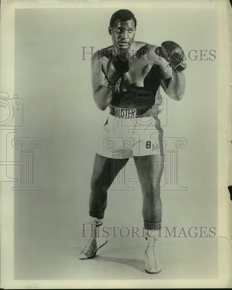 Press Photo Poster painting Boxer Buster Mathis - sas14894