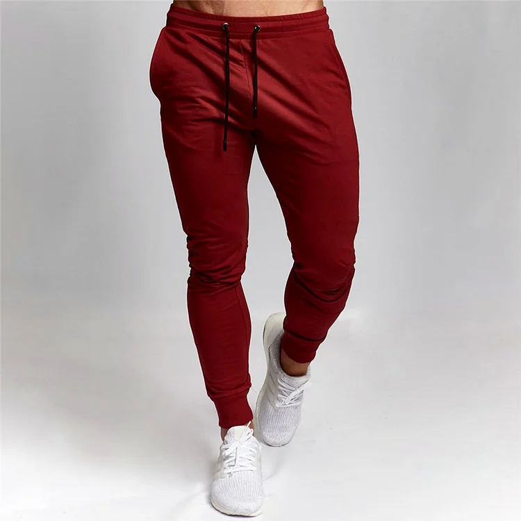 PASUXI OEM Custom Wholesale Fitness Sports Gym Wear Running Men's Jogging Pants for Outdoor Activity Training Men Trousers huanwei