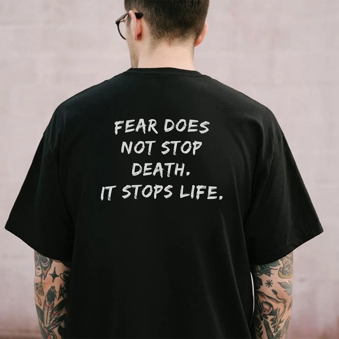 FEAR DOES NOT STOP DEATH, IT STOPS LIFE Black Print T-shirt