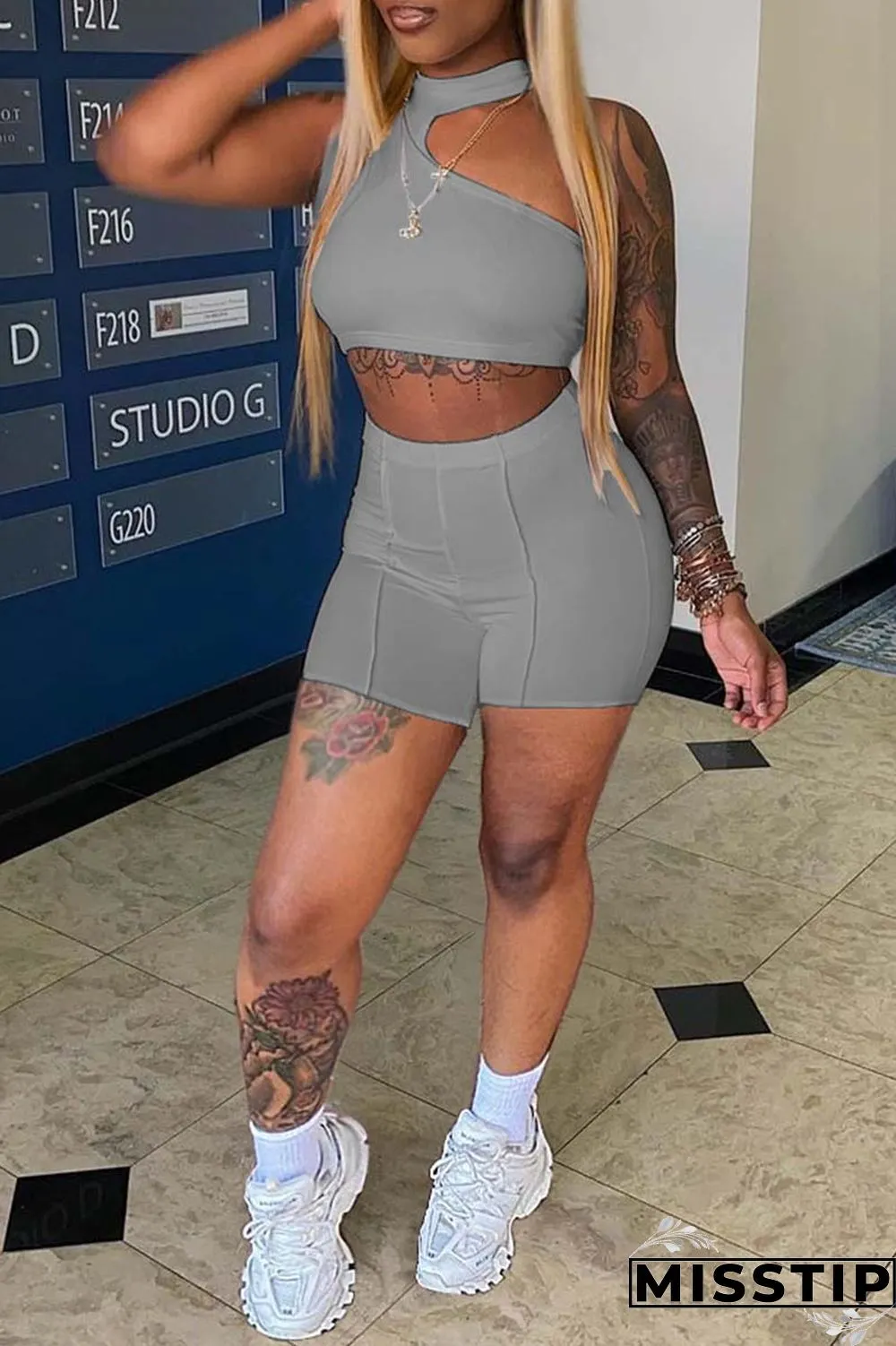 Orange Sexy Casual Solid Hollowed Out Half A Turtleneck Sleeveless Two Pieces