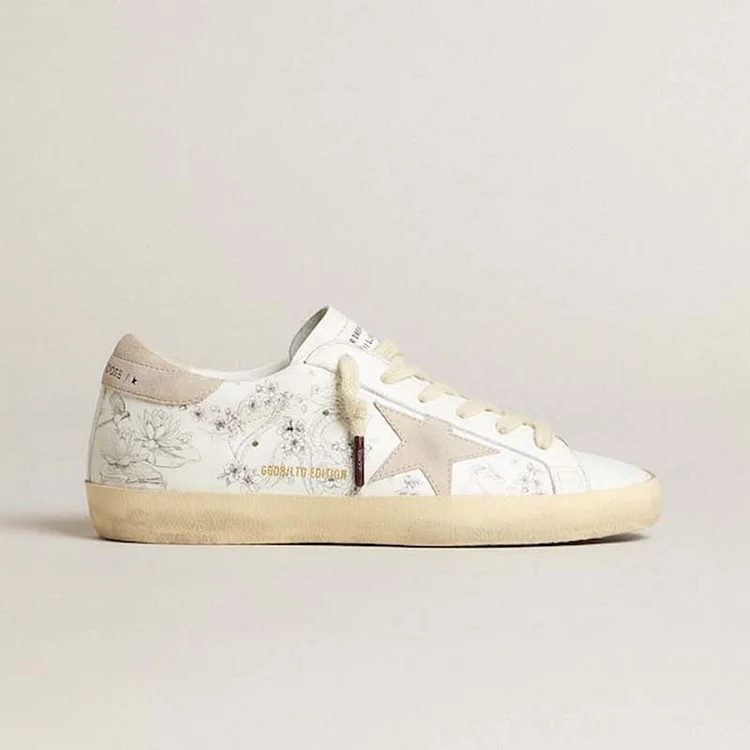 Golden Goose Super-Star Women LTD CNY de cuero blanco con escritura en la parte superior