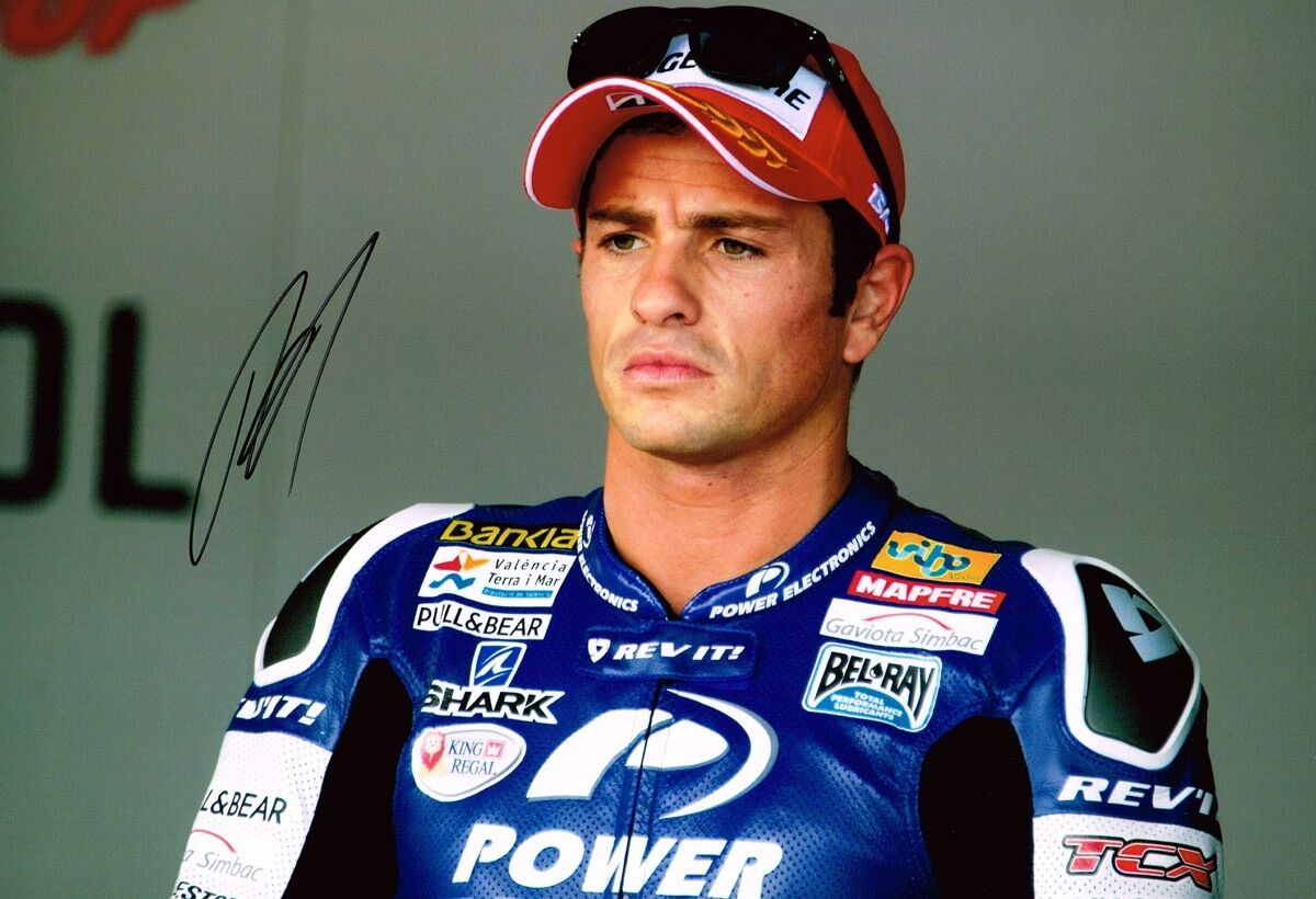 Randy De Puniet Autograph MotoGP Aspar Racing Team SIGNED 12x8 Photo Poster painting AFTAL COA